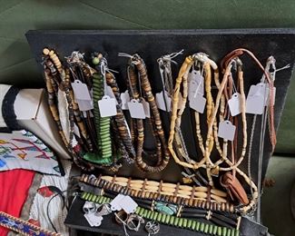 Beaded necklaces and belt