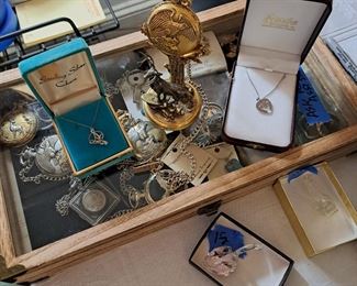 Pocket watches and necklaces