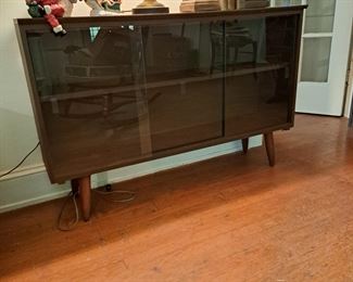 Mid-century console with sliding glass doors