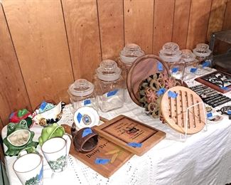 Glass cannisters, vintage trivets and cutting boards