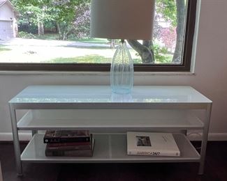 Metal coffee table with glass top and 2 glass shelves