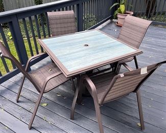 Metal patio dining table and 4 chairs