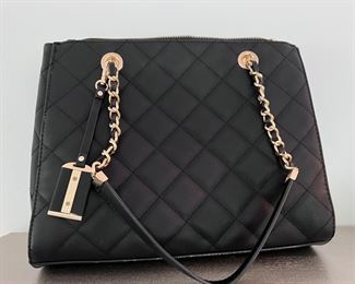 Madison West leather quilted purse