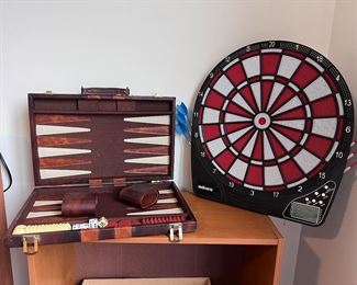 Travel backgammon game and electronic dartboard