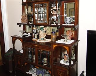 Antique Display cabinet (87x5'x17) with Marquetry Loaded with German beer steins, Glassware etc.