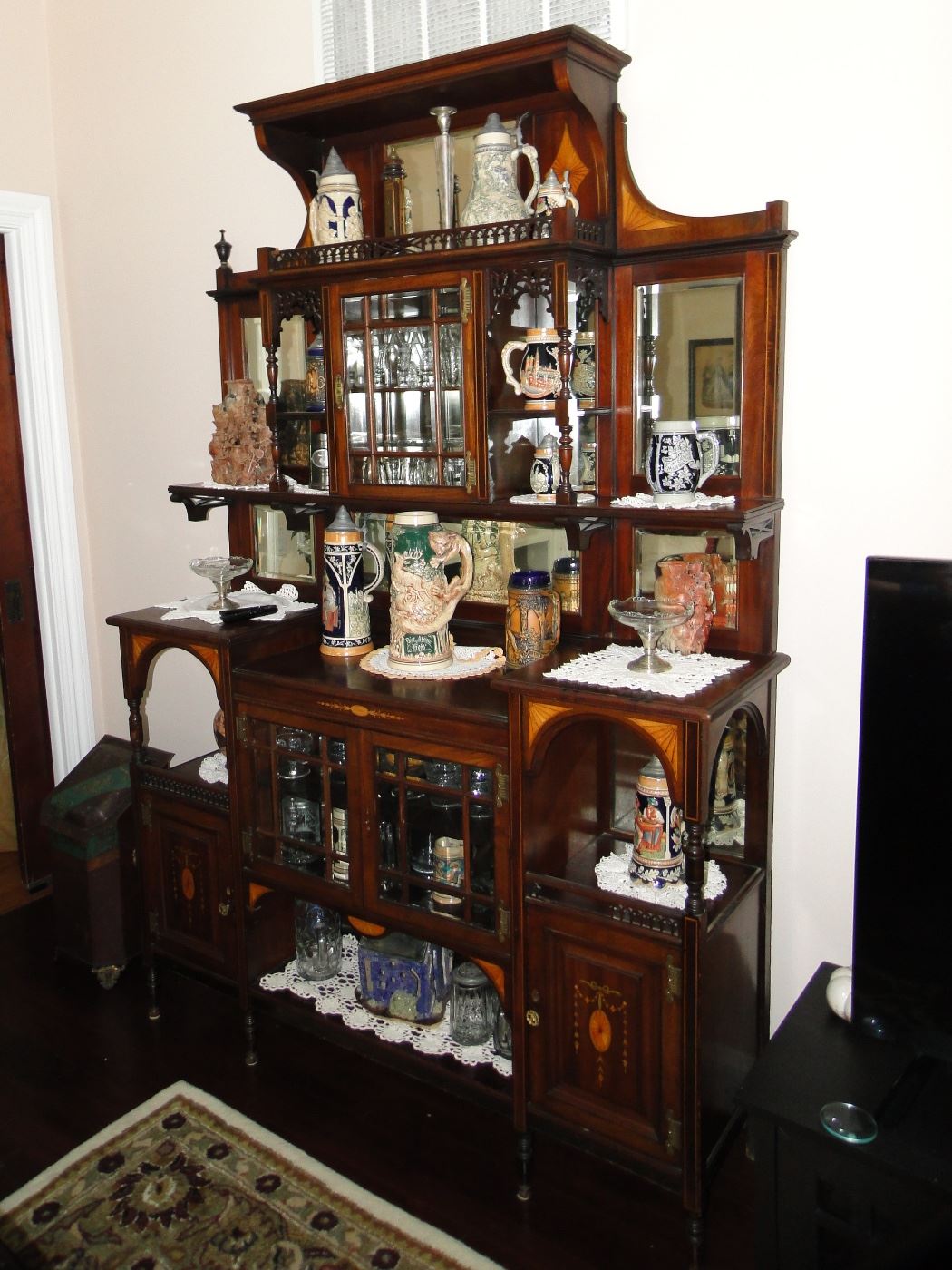 Antique Display cabinet (87x5'x17) with Marquetry Loaded with German beer steins, Glassware etc.