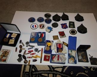 Military medals patches paperwork