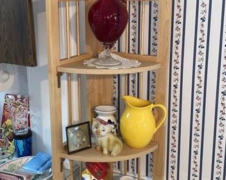 Ruby red art glass pitcher among the kitchen ware 