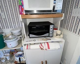 Microwave and stand along with toaster oven 