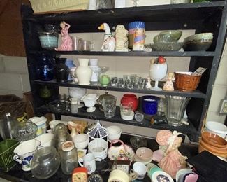 Shelf after shelf of vintage china, glass and planters