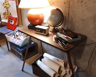 Posters and vintage things are in the basement.  Basement door is directly across from the front entrance.