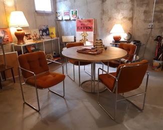 Chromcraft dining, basement, a really groovy set.  I call it "orange".  Diane calls it "rust".  She's probably more correct on this one.