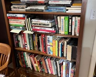 Solid wood bookshelf and books….first editions, signed copies, and books written by Jimmy Smothers