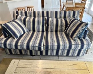 Blue and white striped sofa
