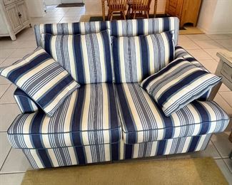 Blue and white striped loveseat