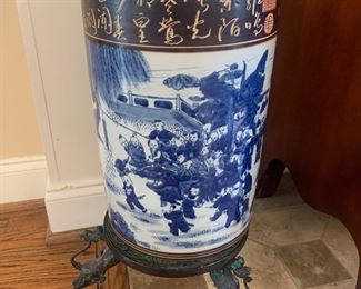 Second half of the 20th C highly detailed and hand painted Chinese porcelain Umbrella vase with hand forged base $1,200