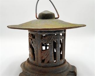 Vintage Japanese Asian Cast Iron Pagoda. 11 inches tall with handles
top is 10 inches wide