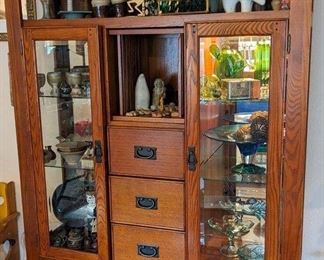 Fabulous cabinet with through tendons and mirrored back. Great mid-century modern piece. 