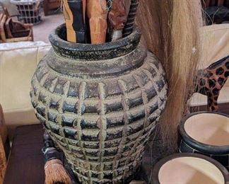 Urn with African walking sticks 