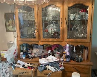 Yes if you look closely there is some very nice China in there.  This cabinet will be cleared out by Friday and I can’t guarantee the China will still be there so make me an offer NOW!!  