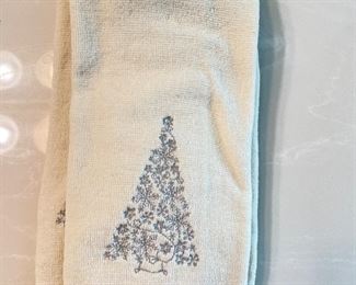 Pair of white hand towels with silver Christmas trees, was  $4, NOW $2