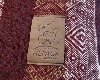 Leather identification tag on Peruvian throw~