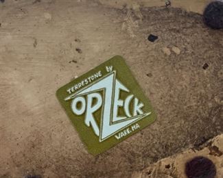 Stamp on bottom of Orzeck Fisherman & boy statue.