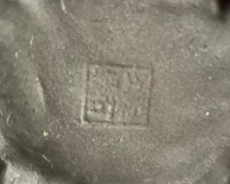 Stamp on bottom of Asian figurine~