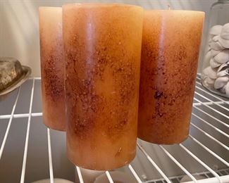 3 amber pillar candles,  $10