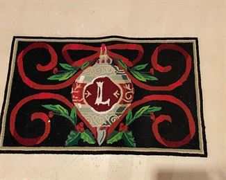 "L" holiday rug,  was $20, NOW 412