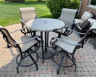 Outdoor pub style patio set - Table & 4 swivel chairs, ( chip on table),  was $199, NOW $150