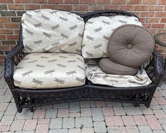 Wicker Glider with dragonfly seat cushions (one inner cushion missing) & two throw pillows,  was $225, NOW $185