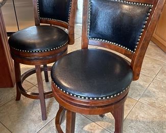 Pair of black leather, counter height, swivel stools, 18"W x 17"D x 26" seat height,  was $175, NOW $99