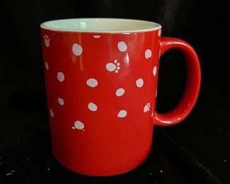Red mug with paw prints, $2