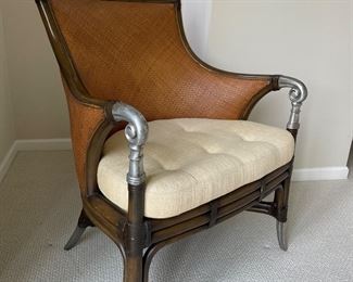 Unique arm chair(probable Palacek) with metal legs and metal scroll at end of arms, tight woven wicker backing, upholstered seat, (small tear in wicker - see following picture), 28"W x 30"D x 37"H,  (Retail $1275),   was $495, NOW $345