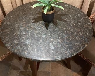 Additional view of stone top of table ~