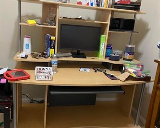 Large Desk
Good condition, some marks on top of desk
On wheels
5’ across x 30 1/2” deep x 29” tall to top of desk, 58 1/2” tall to very top of shelf.
Must be able to move and load yourself.