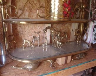 Brass wall shelf, brass animal figures