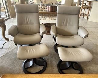 Stressless arm chairs and ottomans