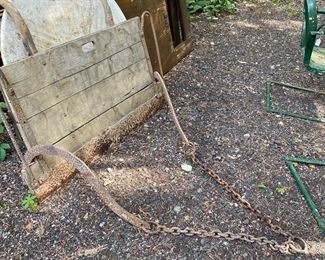 Slip/scoop scraper grader