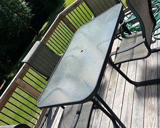 Patio table and 4 slingback rocker armchairs