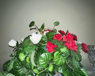 Artificial floral arrangement in basket