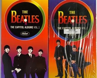 2004 and 2006 The Beatles The Capitol Albums Vol. 1 and 2 - Vol. 2 Wrapped In Plastic Film and Tape, Both in Like New Condition
