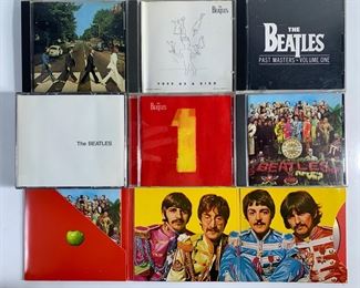 8 Beatles Music CDs - Abbey Road, Free As A Bird, Past Masters Vol One, White Label, 1, and Two Copies of Sgt. Peppers Lonely Hearts Club Band - All In Good Condition

