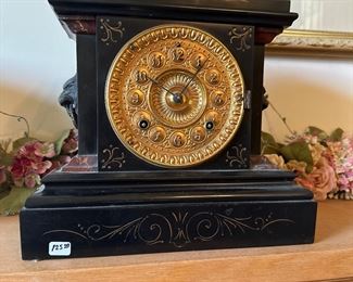 Ansonia metal case mantle clock with Lionhead handles $125