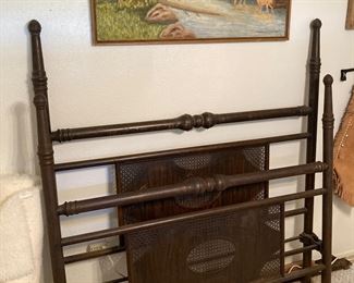 antique iron four-post bed frame