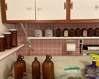 amber glassware--creamer jars, Levi Garrett snuff bottles, bleach bottles