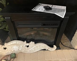 electric fireplace  w/ remote and papers 