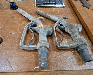 TWO GAS PUMP NOZZLES
