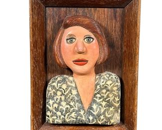 MEG SMEAL FRAMED BUST | Polychrome pottery bust of a woman, signed Meg Smeal; mounted into a wood frame. - l. 9.5 x w. 6.5 in (overall)